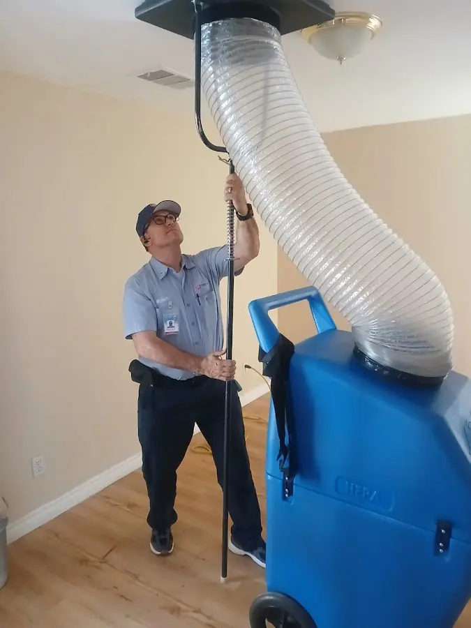 HVAC Installation technician using HEPA equipment in Independent Hill